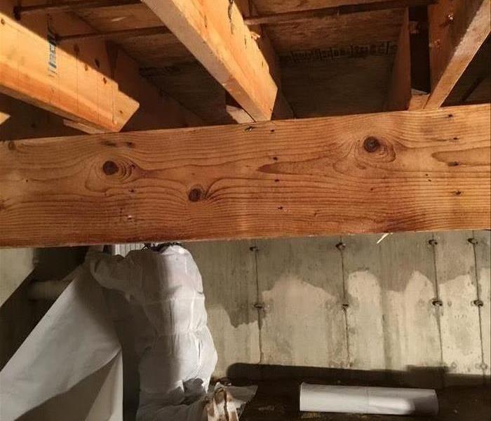 Image of floor joist after mold remediation service completed by Servpro.