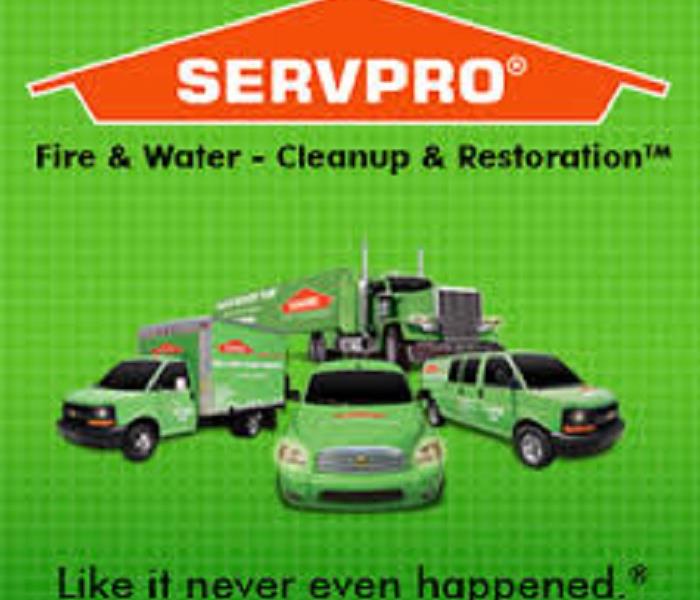 Servpro logo and vehicles